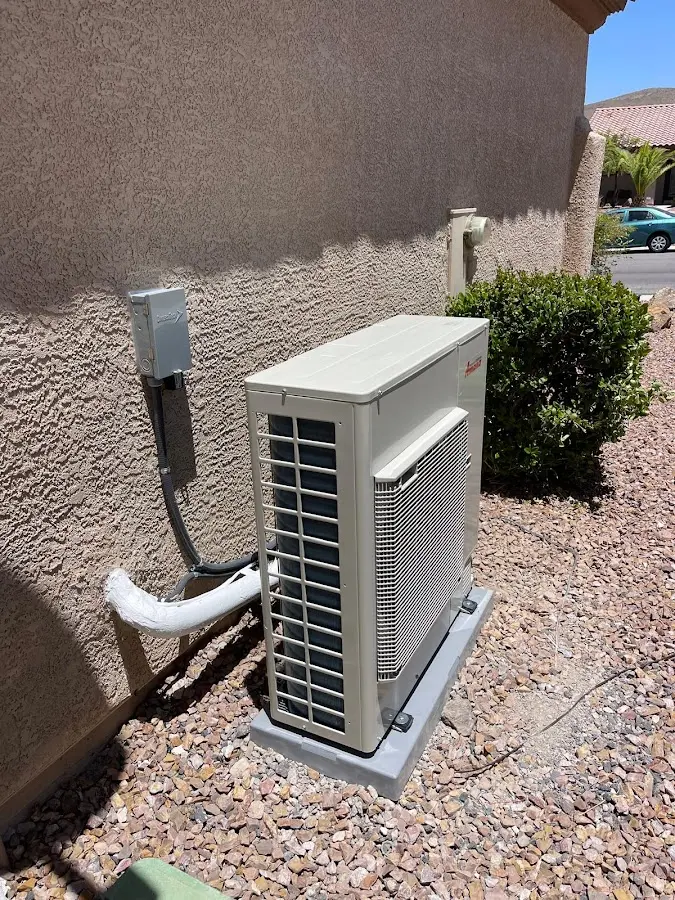 Residential air conditioning condenser unit in Edgewater