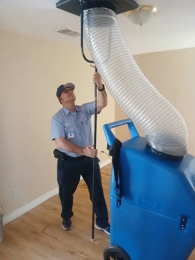 Mini Split Installation technician using HEPA equipment in Edgewater